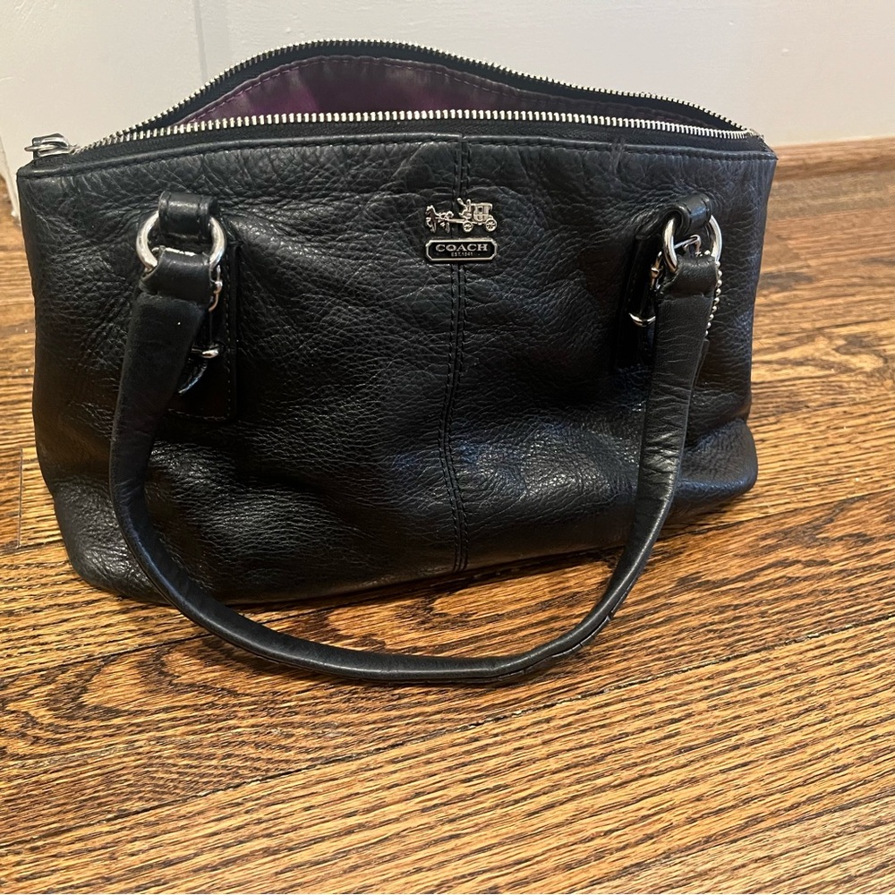 Late 2000’s small black pebbled leather Coach purse with purple lining
